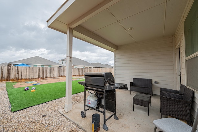 6205 Globe Life Ct, Odessa, TX 79762 - fenced backyard featuring a patio