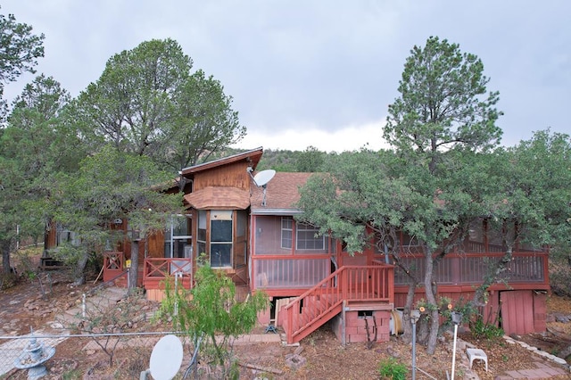 101 Stage Coach Pass, Fort Davis, TX 79734 - back of property featuring a wooden deck and stairs