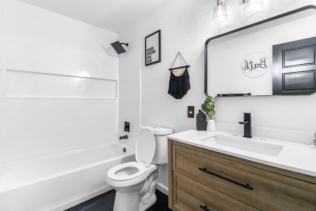 bathroom featuring vanity, baseboards, shower / bath combination, and toilet