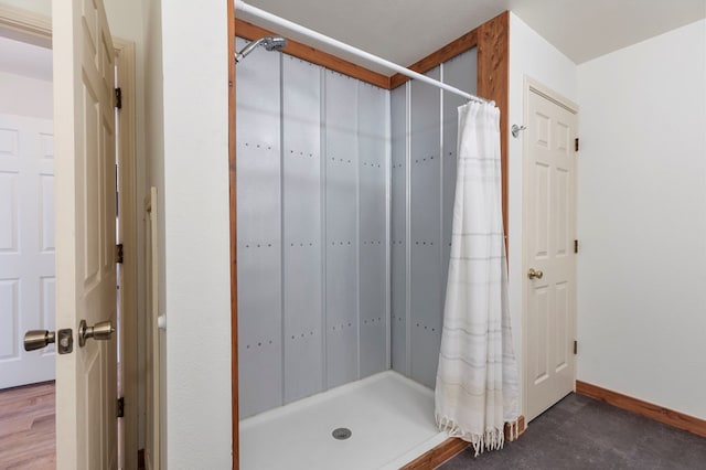 308 N 10th St, Alpine, TX 79830 - bathroom with a shower stall and baseboards