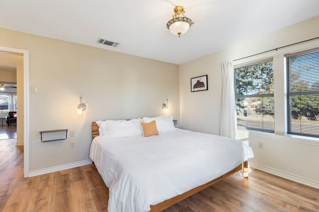 308 N 10th St, Alpine, TX 79830 - bedroom featuring wood finished floors and baseboards