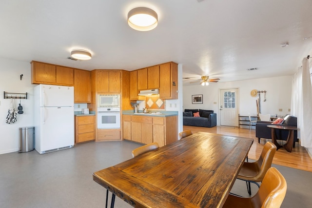 308 N 10th St, Alpine, TX 79830 - dining room with ceiling fan and baseboards