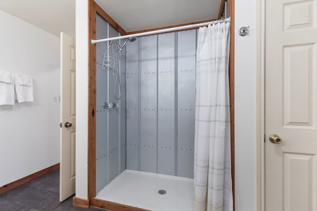 308 N 10th St, Alpine, TX 79830 - bathroom with a stall shower and baseboards