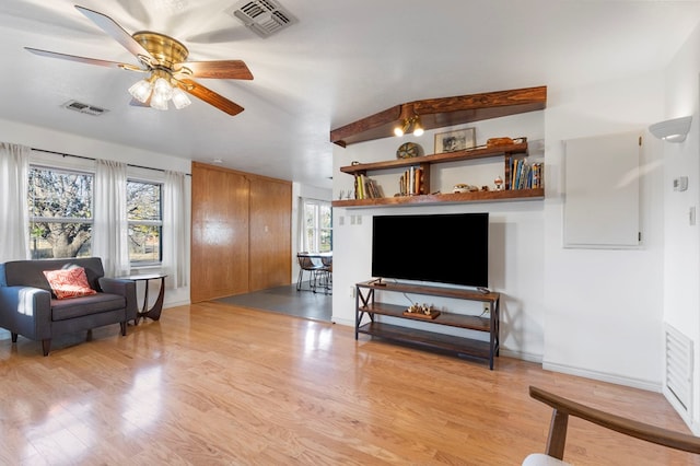 308 N 10th St, Alpine, TX 79830 - living area with ceiling fan, light wood-style flooring, and baseboards