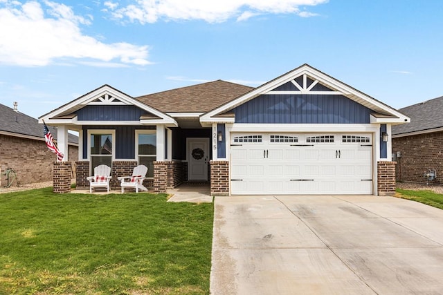 1215 E 93rd St, Odessa, TX 79765 - craftsman inspired home featuring brick siding, a garage, a front yard, driveway, and a porch