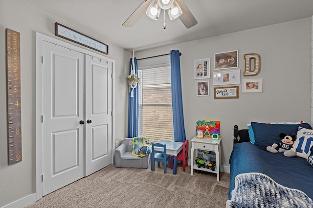 1215 E 93rd St, Odessa, TX 79765 - bedroom featuring carpet flooring, a closet, ceiling fan, and baseboards