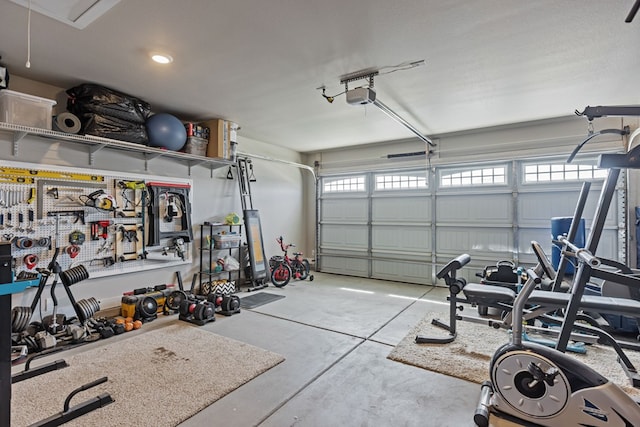1215 E 93rd St, Odessa, TX 79765 - garage featuring a garage door opener