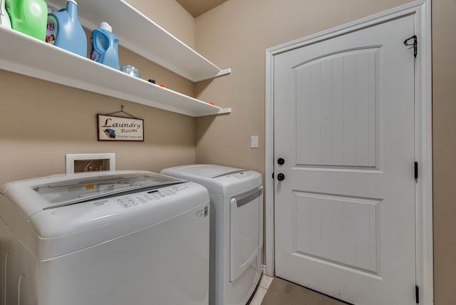 7302 Giotto St, Odessa, TX 79765 - laundry area featuring independent washer and dryer and light tile patterned floors