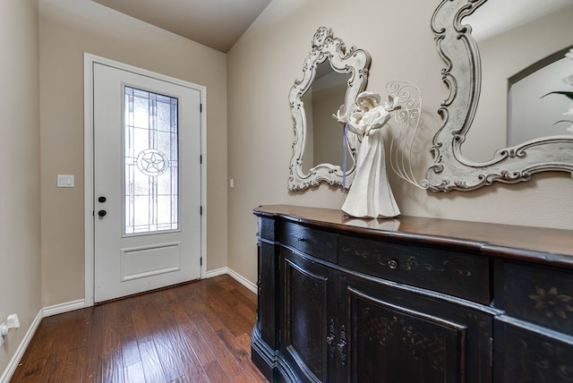 7302 Giotto St, Odessa, TX 79765 - foyer entrance featuring baseboards and dark wood-style flooring