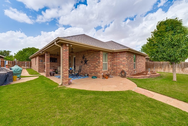 7302 Giotto St, Odessa, TX 79765 - rear view of property featuring brick siding, a patio, and a shingled roof