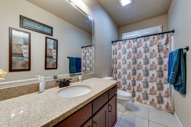 7302 Giotto St, Odessa, TX 79765 - bathroom with toilet, tile patterned flooring, vanity, and curtained shower