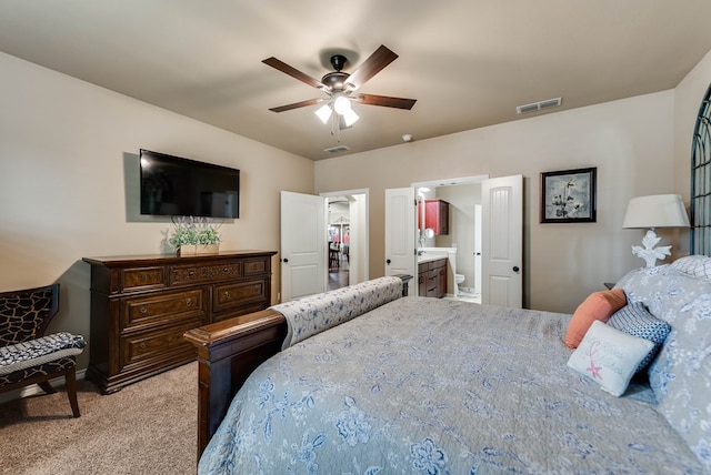 7302 Giotto St, Odessa, TX 79765 - bedroom with carpet, ensuite bathroom, a ceiling fan, and baseboards