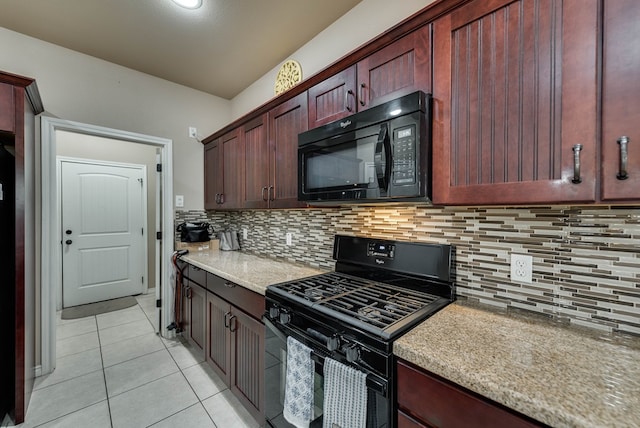 7302 Giotto St, Odessa, TX 79765 - kitchen with black appliances, light tile patterned floors, decorative backsplash, and light stone counters