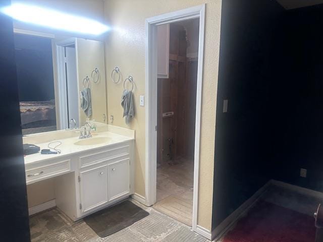 606 NW 14th St, Andrews, TX 79714 - bathroom featuring vanity
