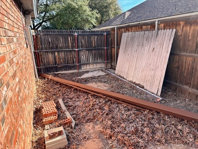 1203 S Nelson Ave, Monahans, TX 79756 - view of yard with fence