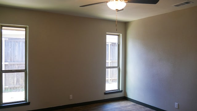 4603 N Tom Green Ave, Odessa, TX 79762 - spare room with dark wood-type flooring and ceiling fan