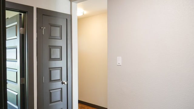 4603 N Tom Green Ave, Odessa, TX 79762 - corridor featuring baseboards and wood finished floors