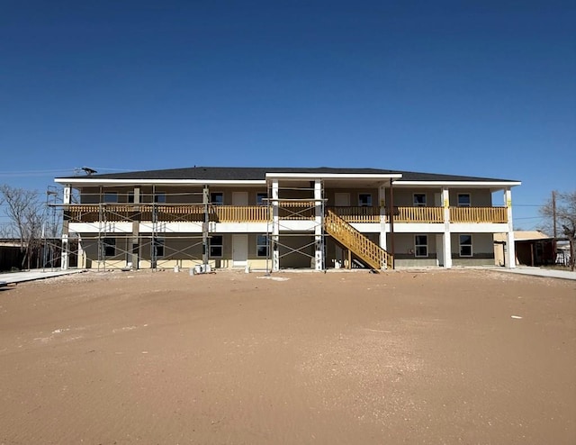 view of building exterior featuring stairway