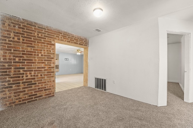 4530 W Morris St, Odessa, TX 79764 - carpeted empty room with ceiling fan and a textured ceiling