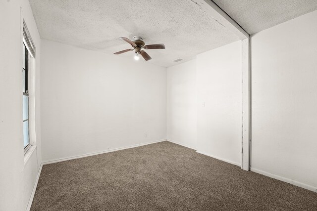 4530 W Morris St, Odessa, TX 79764 - carpeted empty room with a textured ceiling, ceiling fan, and baseboards