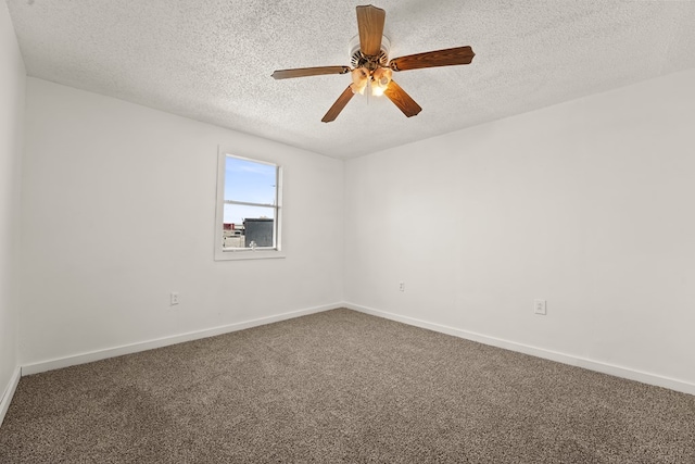 4530 W Morris St, Odessa, TX 79764 - carpeted spare room with a textured ceiling, a ceiling fan, and baseboards