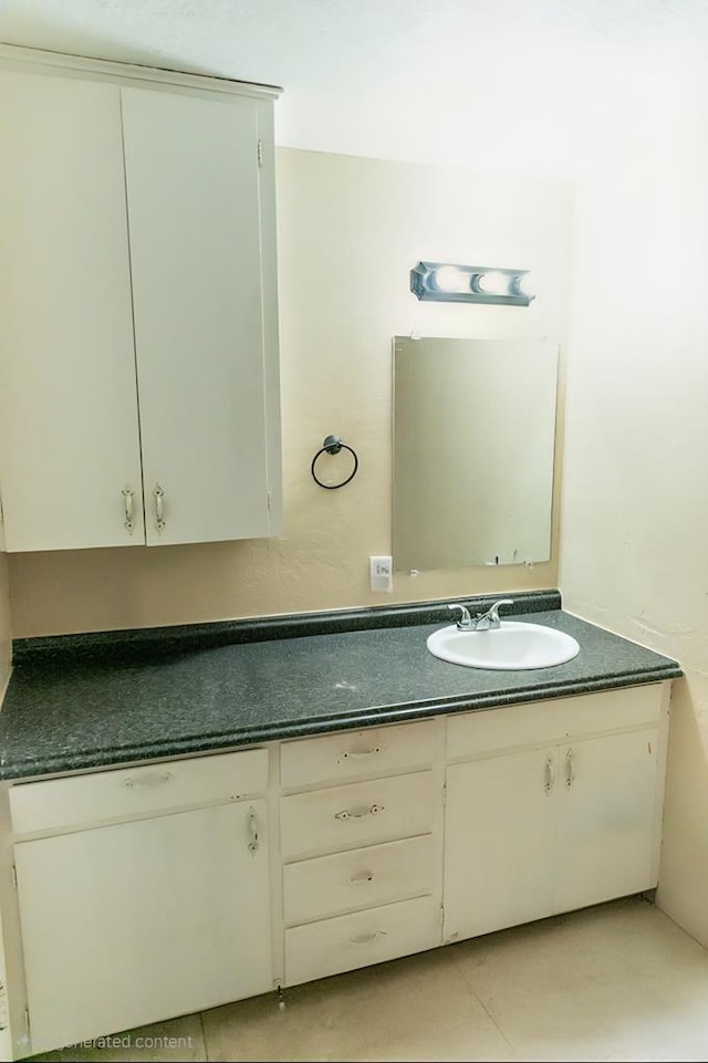 3703 N Jackson Ave, Odessa, TX 79762 - bathroom featuring double vanity and tile patterned flooring