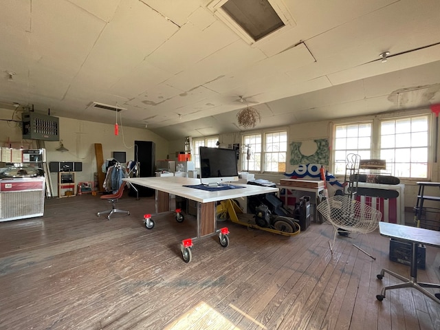 misc room featuring hardwood / wood-style flooring and lofted ceiling