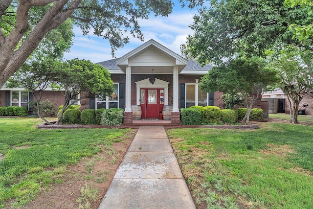 1000 S Nelson Rd, Monahans, TX 79756 - view of front of home featuring a front yard and brick siding