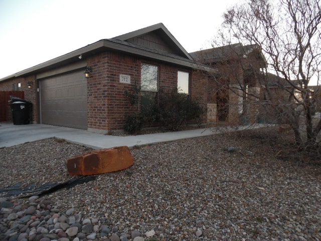 view of property exterior featuring a garage