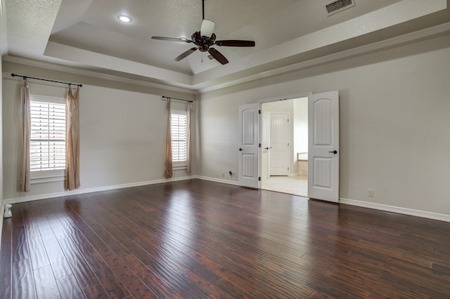 259 County Rd 304, Seminole, TX 79360 - empty room with a raised ceiling, ceiling fan, baseboards, wood finished floors, and recessed lighting