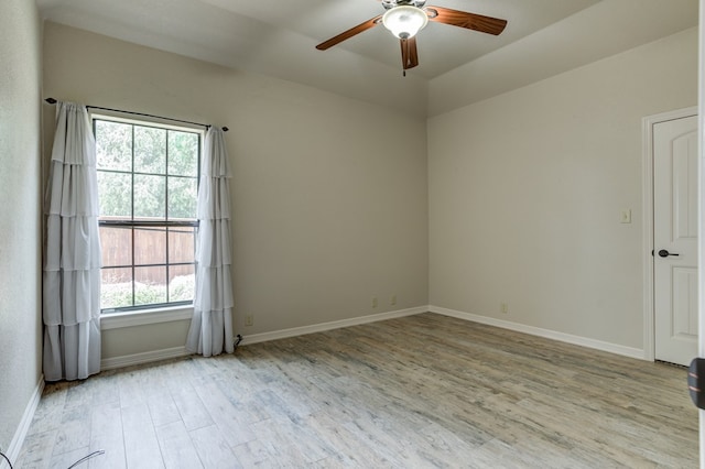 259 County Rd 304, Seminole, TX 79360 - empty room featuring wood finished floors, a ceiling fan, and baseboards