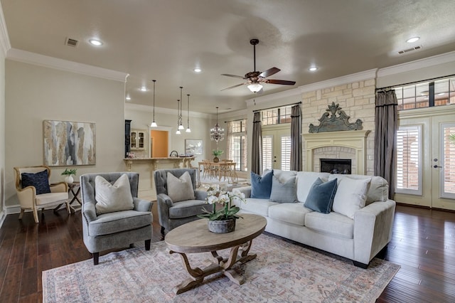 259 County Rd 304, Seminole, TX 79360 - living room with french doors, plenty of natural light, ceiling fan, recessed lighting, and crown molding