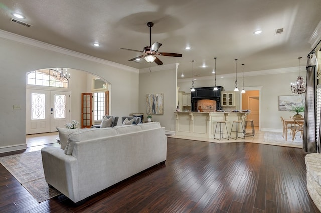 259 County Rd 304, Seminole, TX 79360 - living area with a chandelier, ornamental molding, baseboards, dark wood-style floors, and recessed lighting