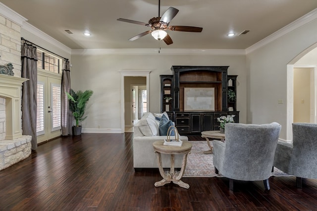 259 County Rd 304, Seminole, TX 79360 - living area featuring hardwood / wood-style flooring, arched walkways, a ceiling fan, ornamental molding, and baseboards