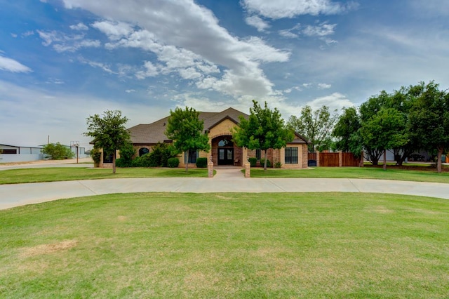 259 County Rd 304, Seminole, TX 79360 - view of front facade featuring french doors and curved driveway