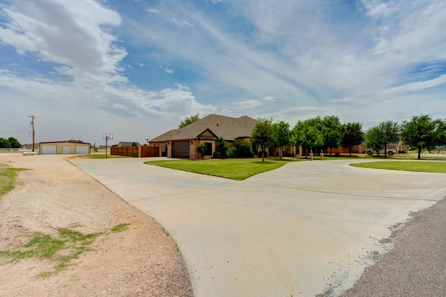 259 County Rd 304, Seminole, TX 79360 - view of front of home with concrete driveway and a garage