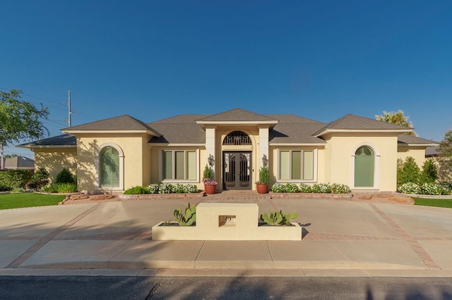 40 Muirfield Dr, Odessa, TX 79762 - mediterranean / spanish home featuring stucco siding and french doors