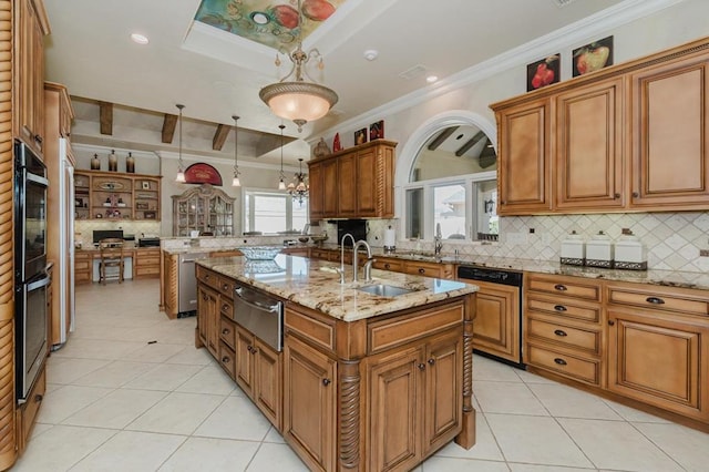 40 Muirfield Dr, Odessa, TX 79762 - kitchen with a warming drawer, a sink, brown cabinets, tasteful backsplash, and light tile patterned floors