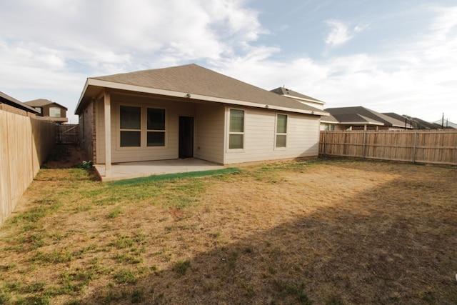 7319 W Pile Ranch Rd, Odessa, TX 79765 - rear view of house with a patio