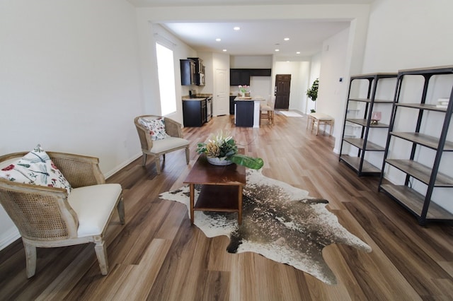 7319 W Pile Ranch Rd, Odessa, TX 79765 - living area with light wood finished floors, baseboards, and recessed lighting