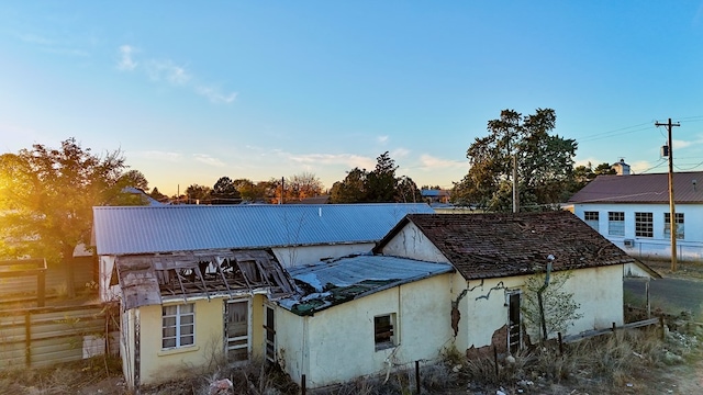 view of property exterior at dusk