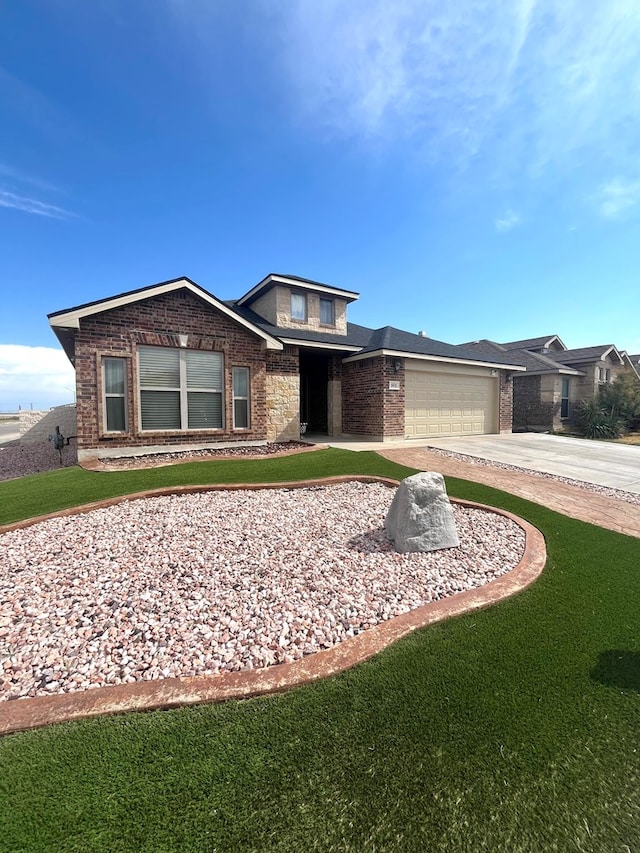 view of front facade featuring brick siding, concrete driveway, an attached garage, and a front lawn