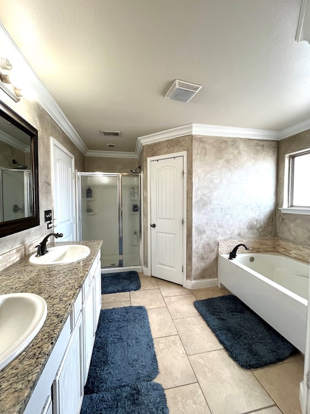 bathroom with a stall shower, tile patterned flooring, a bath, double vanity, and crown molding