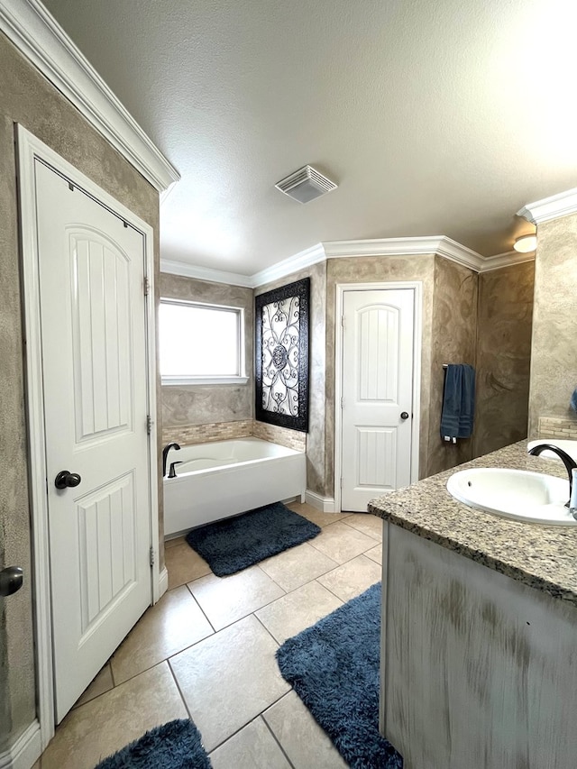 full bathroom featuring ornamental molding, a bath, tile patterned flooring, vanity, and a textured ceiling