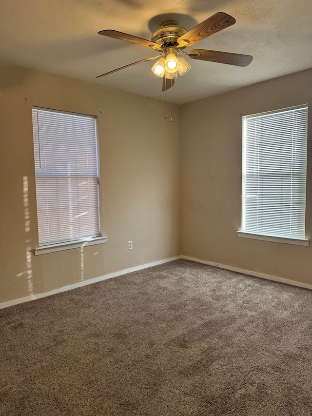 3811 Henderson Ave, Odessa, TX 79762 - spare room with ceiling fan and carpet flooring