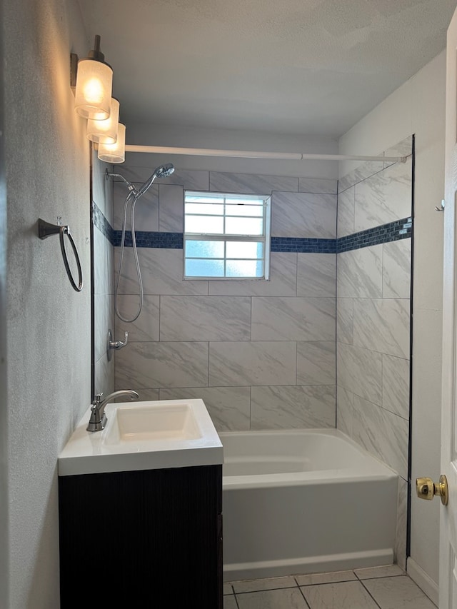 3811 Henderson Ave, Odessa, TX 79762 - bathroom featuring shower / tub combination, vanity, and marble look tiles