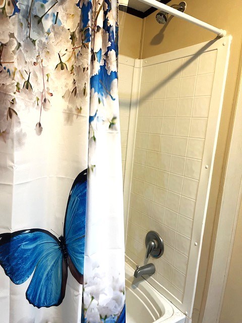 1319 S Broughton Ave, Odessa, TX 79761 - full bathroom with shower / bath combination with curtain