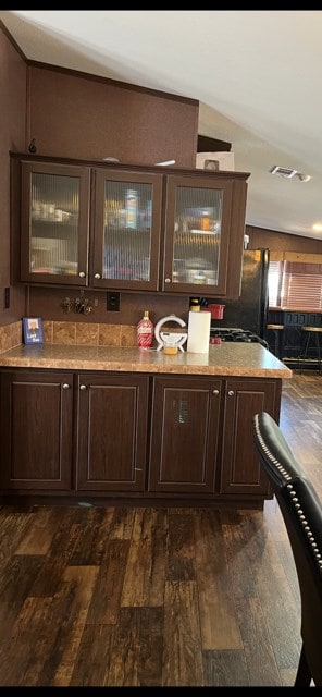 1319 S Broughton Ave, Odessa, TX 79761 - bar area with dark wood-style flooring