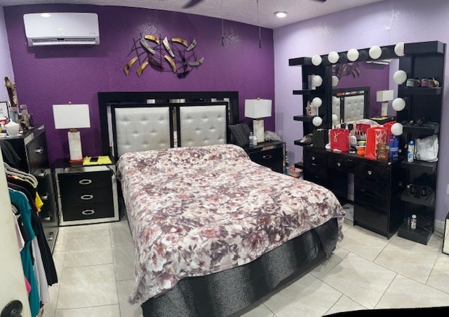 2404 W 10th St, Odessa, TX 79763 - bedroom with an AC wall unit, light tile patterned flooring, and recessed lighting