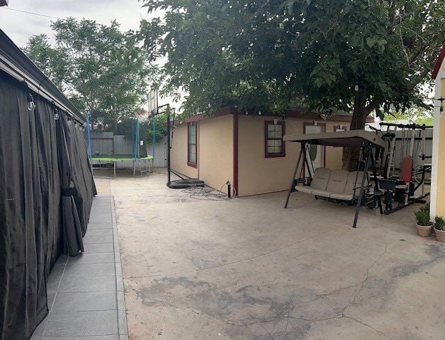 2404 W 10th St, Odessa, TX 79763 - view of patio featuring a trampoline